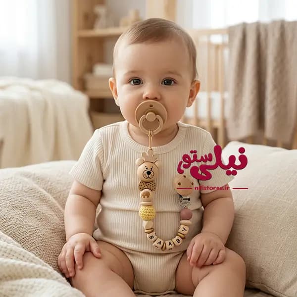 بند پستانک نوزاد چوبی طرح خرس تاجدار حلقه طلایی برند هپی بیبی Happy baby