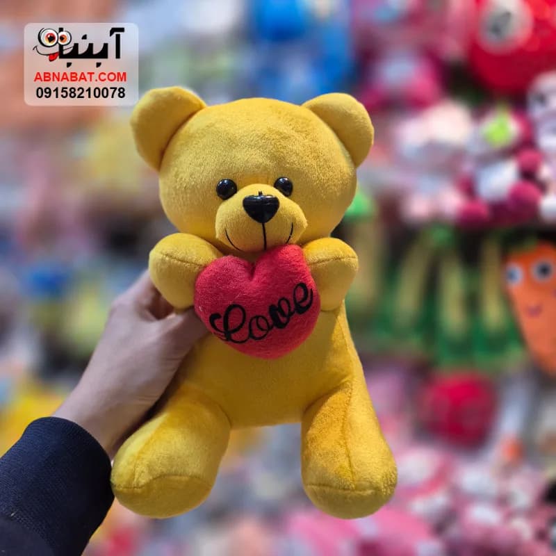 عروسک خرس قلب بدست زرد 30 سانتی کد 1526