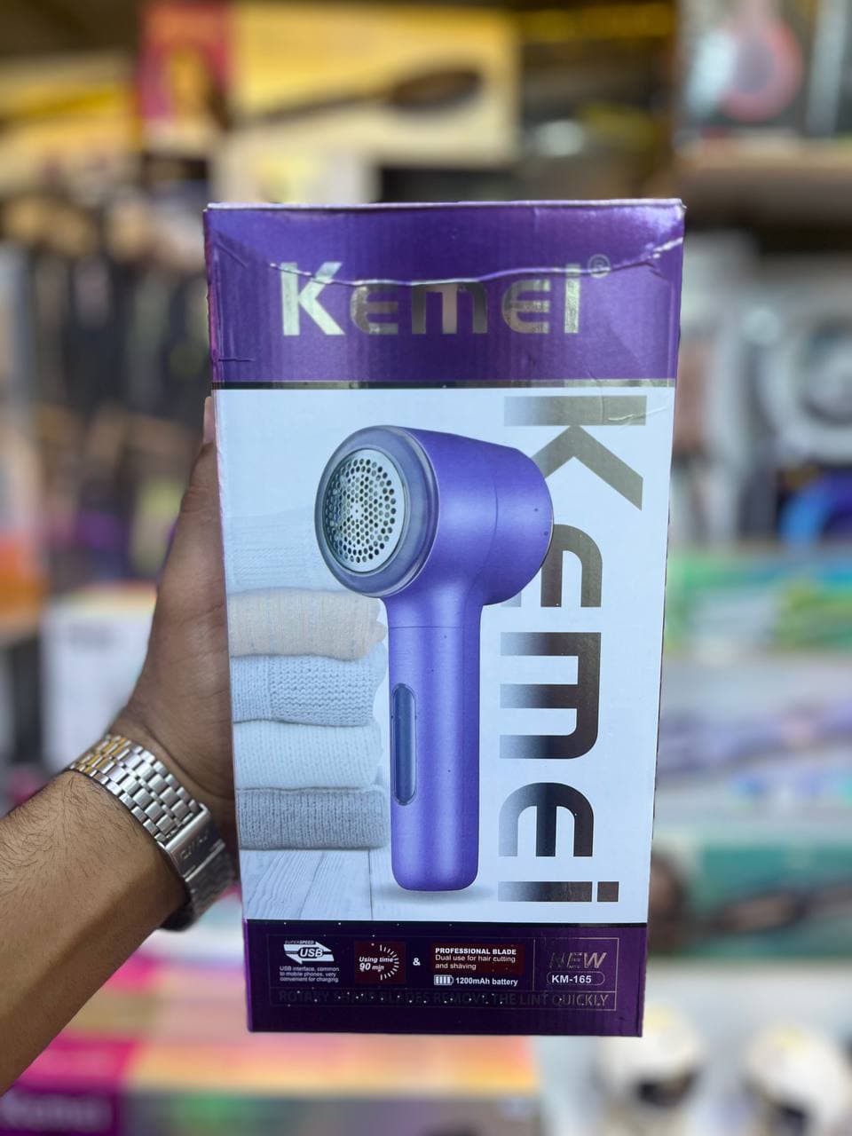 پرزگیر شارژی لباس کیمی مدل KM165 با باتری 1200 و شارژ USB — تصویر ۵