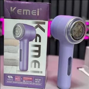 پرزگیر شارژی لباس کیمی مدل KM165 با باتری 1200 و شارژ USB — تصویر ۳