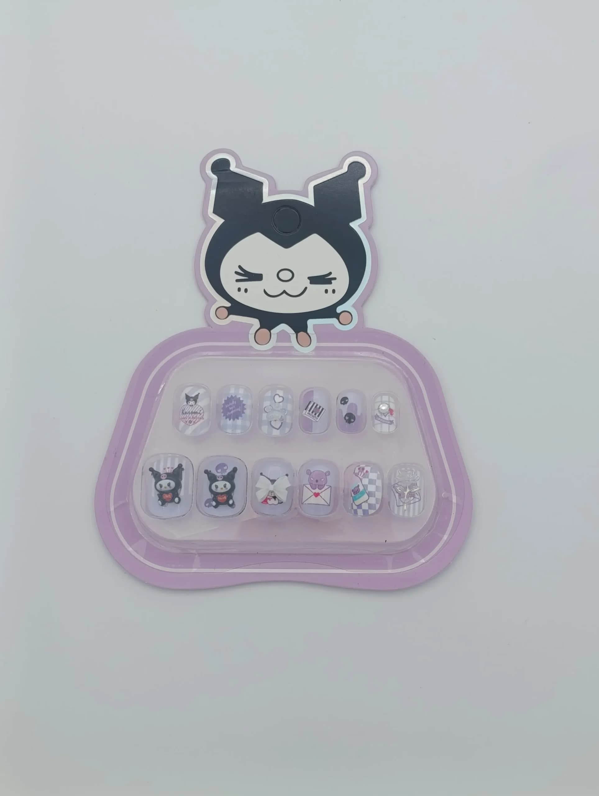 ناخن مصنوعی بچگانه طرح کرومی Sanrio Kuromi بسته ۱۲ عددی | بنفش یاسی فانتزی، چسب ژلهای بدون ضرر، پاپیون ۳ بعدی و نگیندار