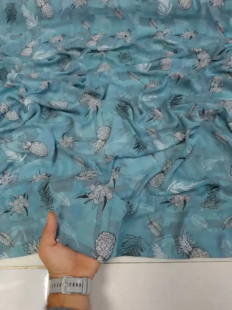 پارچه حریر ساده گلدار آبی — تصویر ۲