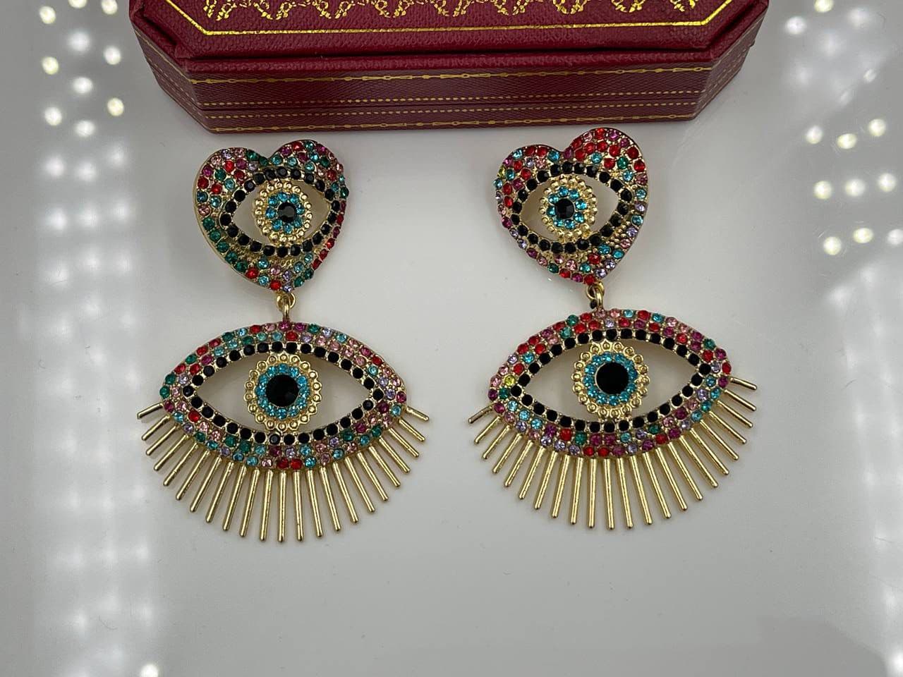 گوشواره طرح قلب و چشم نگین رنگی