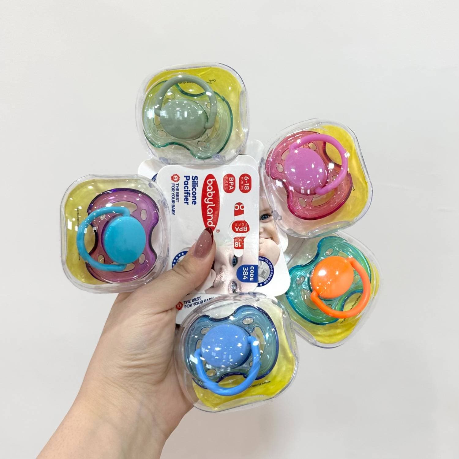 پستانک فندقی شفاف 6 تا 18 ماه بیبی لند baby land کد 384 همه رنگ ها — تصویر ۲
