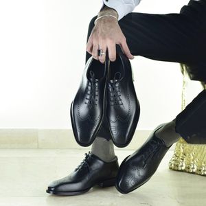 کفش رسمی مردانه کرمانی مدل هَشتَرک چرم طبیعی دستدوز کد 1088