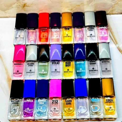 عطر ادکلن جیبی وودی سنس یونیک عمده در روایح مختلف 26 عددی 15 میل ( Uniqe Woody Sence )