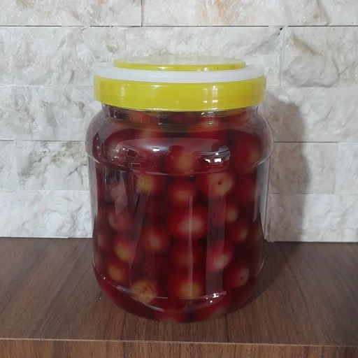 ترشی گوجه سبز تو سرخ (الوچه) (1500گرمی)