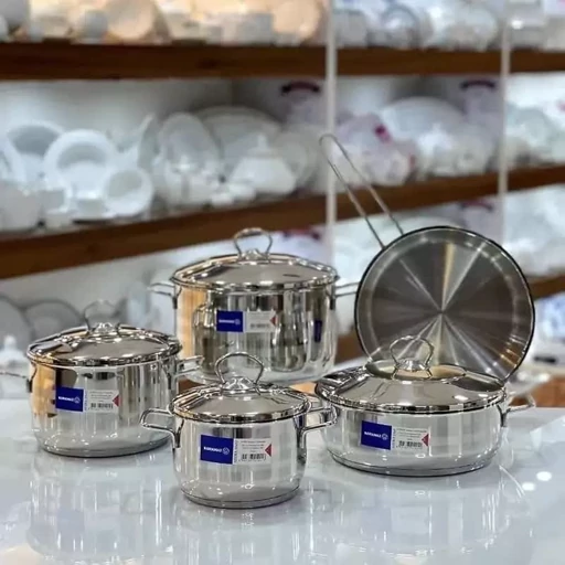 سرویس قابلمه 9 پارچه استیل کورکماز ( کرکماز) اصل ترکیه کف چدن نسوز اصل مدل آسترا و درب خمره ای