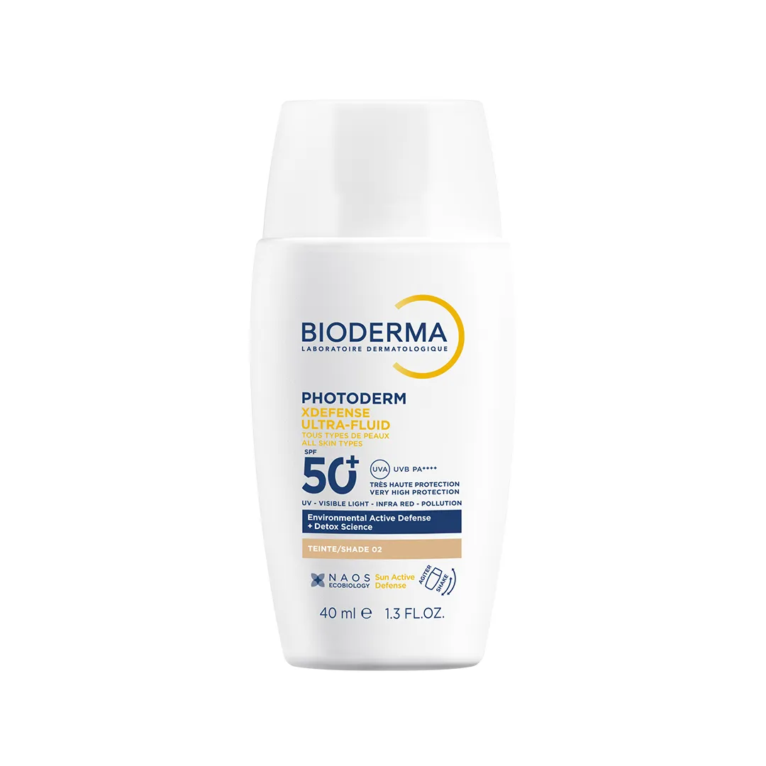 کرم ضد آفتاب رنگی فلوئیدی بایودرما PHOTODERM XDEFENSE ULTRA-FLUID SPF50 شماره 02 حجم 40 میلی لیتری — تصویر ۲