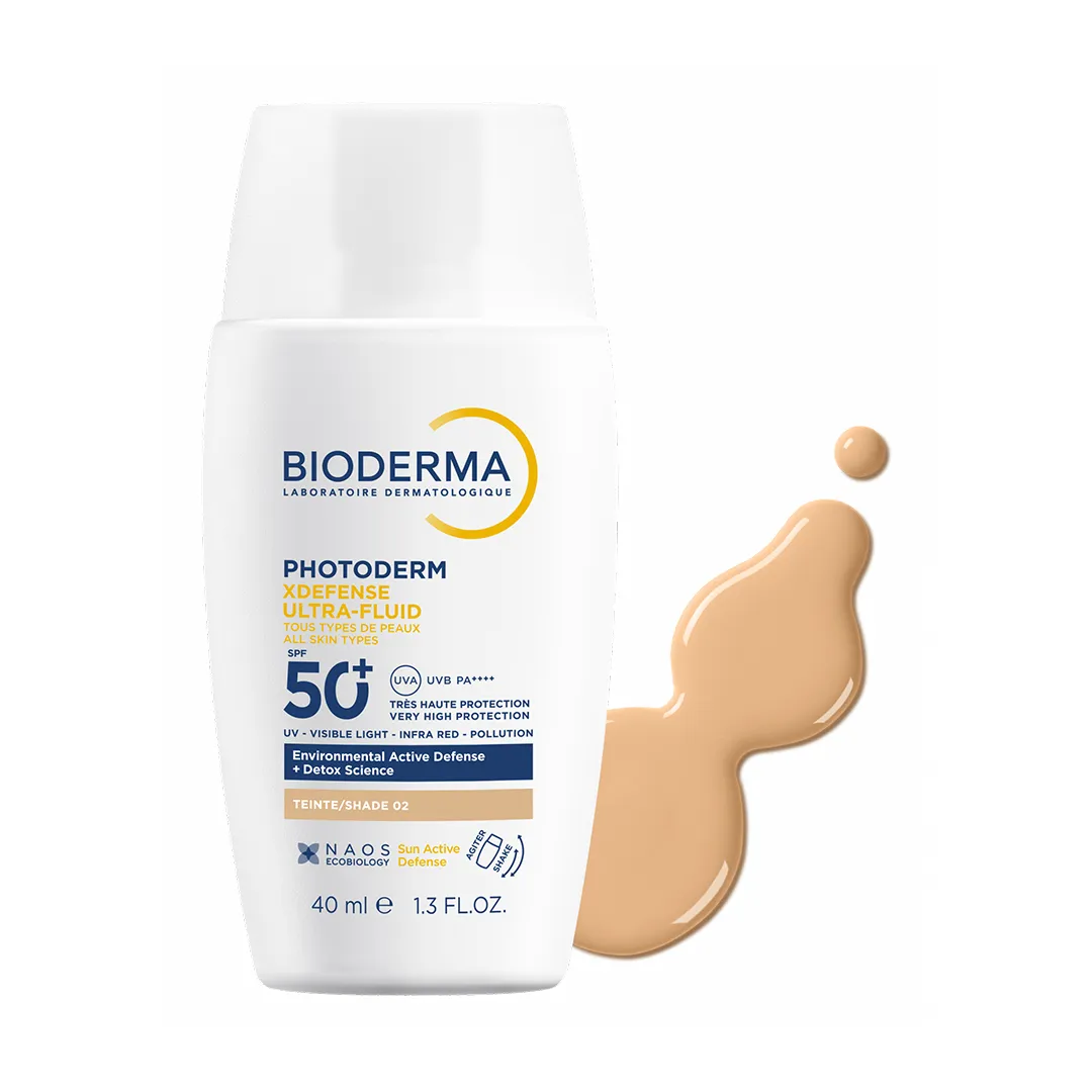 کرم ضد آفتاب رنگی فلوئیدی بایودرما PHOTODERM XDEFENSE ULTRA-FLUID SPF50 شماره 02 حجم 40 میلی لیتری — تصویر ۳