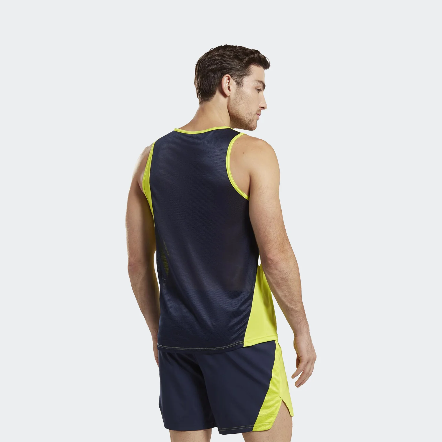 کاور مردانه ریباک مدل SPEEDWICK SINGLET — تصویر ۴