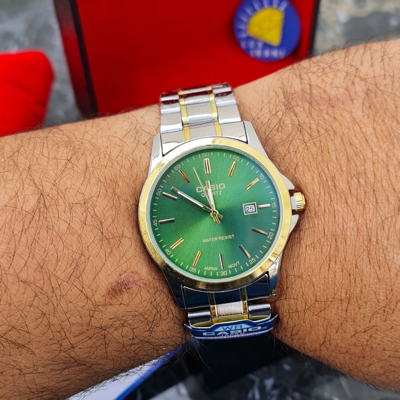 ساعت مردانه کاسیو کد 5607 نقره ای طلایی صفحه سبز — تصویر ۴