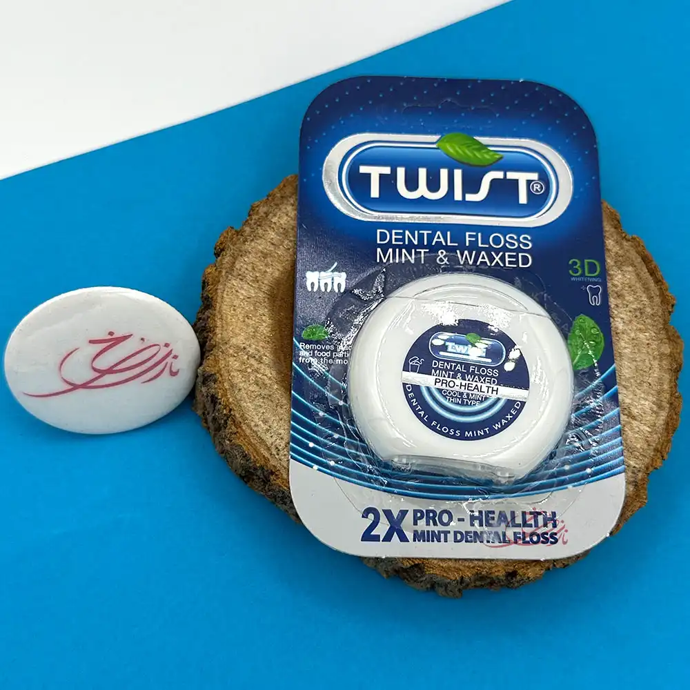 نخ دندان تویست (Twist) مدل Pro-Health نعنایی و مومدار ۵۰ متری — تصویر ۲