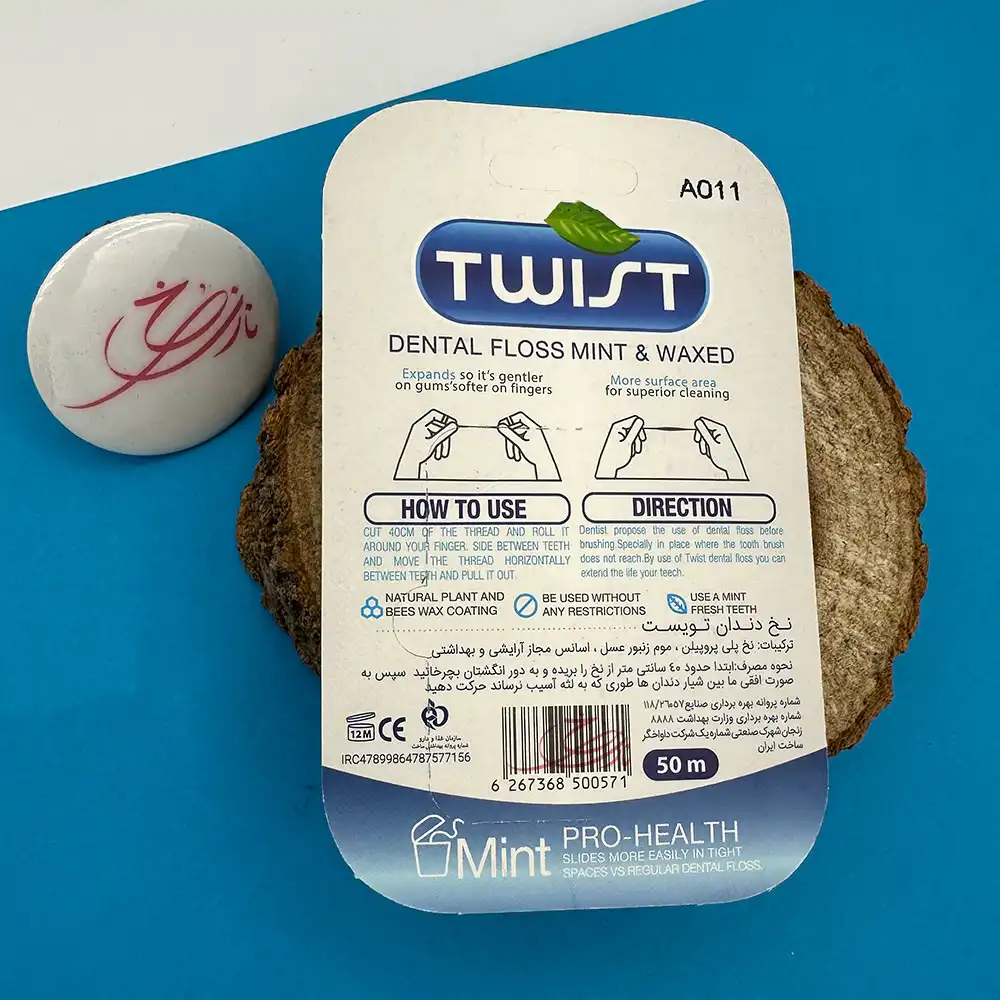 نخ دندان تویست (Twist) مدل Pro-Health نعنایی و مومدار ۵۰ متری — تصویر ۴