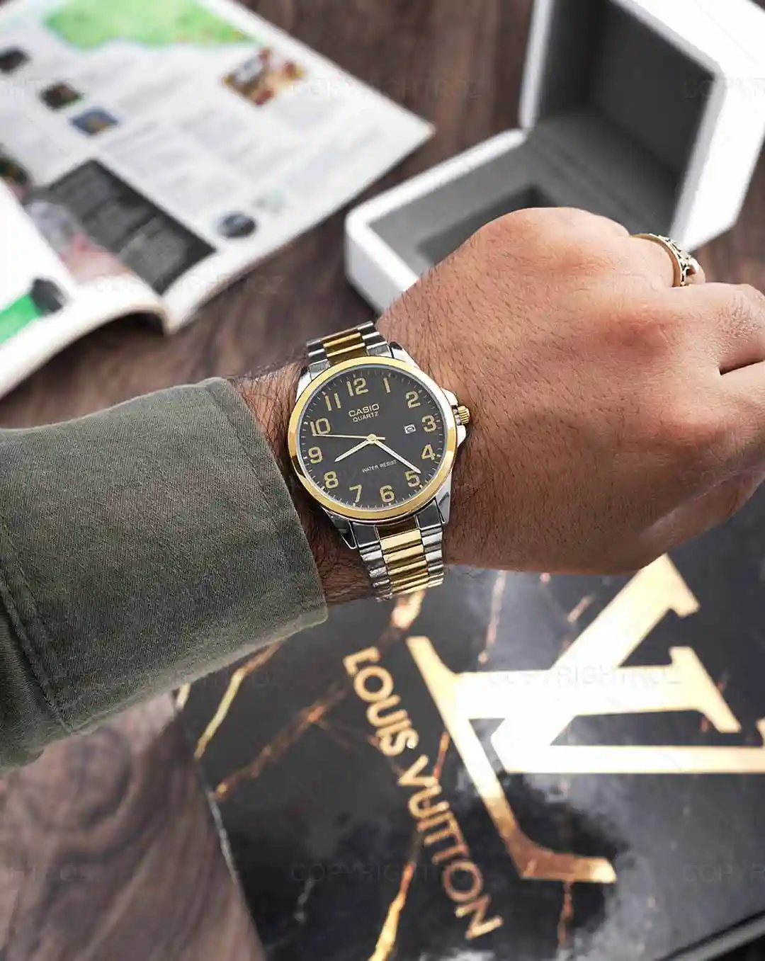 ساعت مچی مردانه کاسیو CASIO مدل 1556 | نقره ای طلایی — تصویر ۳