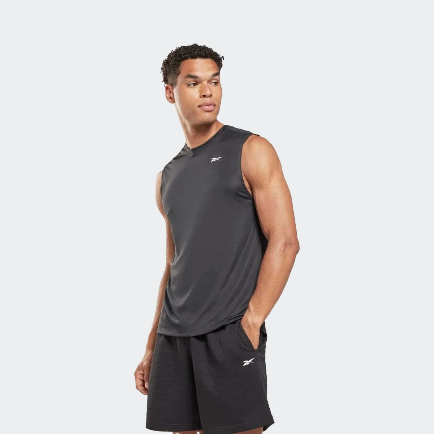 کاور مردانه ریباک مدل Training Sleeveless Tech T-Shirt — تصویر ۳