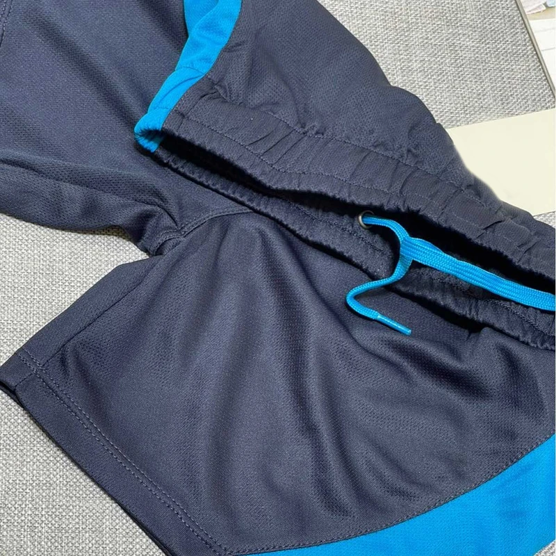 شورتک ورزشی پسرانه مدل 333179 — تصویر ۵