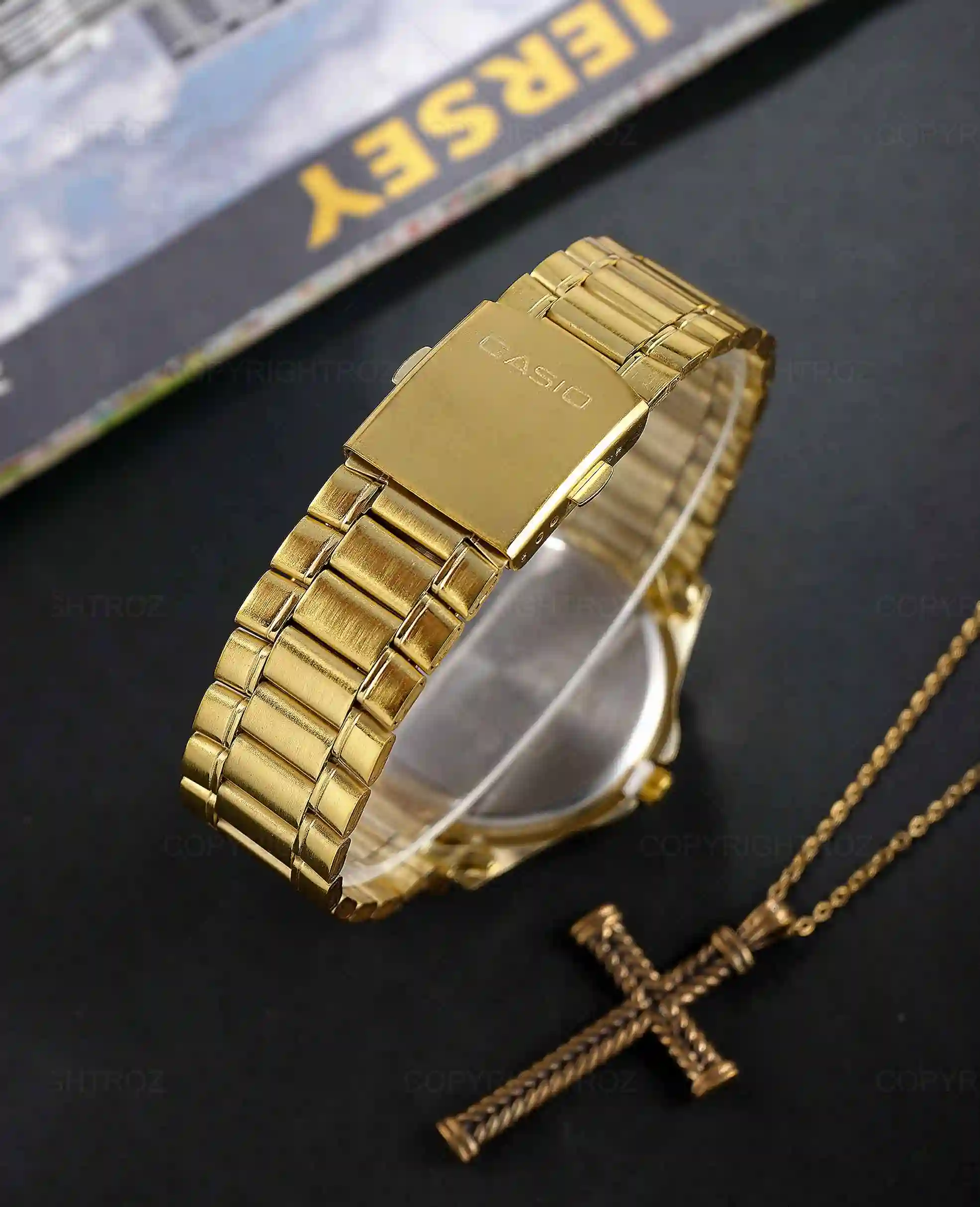 ساعت مچی مردانه کاسیو CASIO طلایی مدل 1215 — تصویر ۵