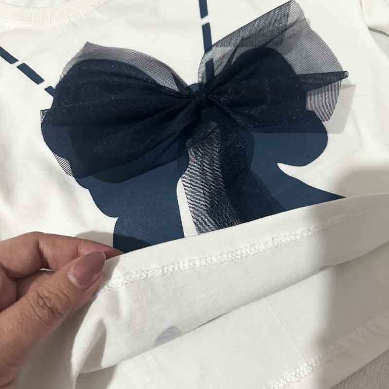 ست تیشرت شلوارک شافل دخترانه طرح پاپیون — تصویر ۴