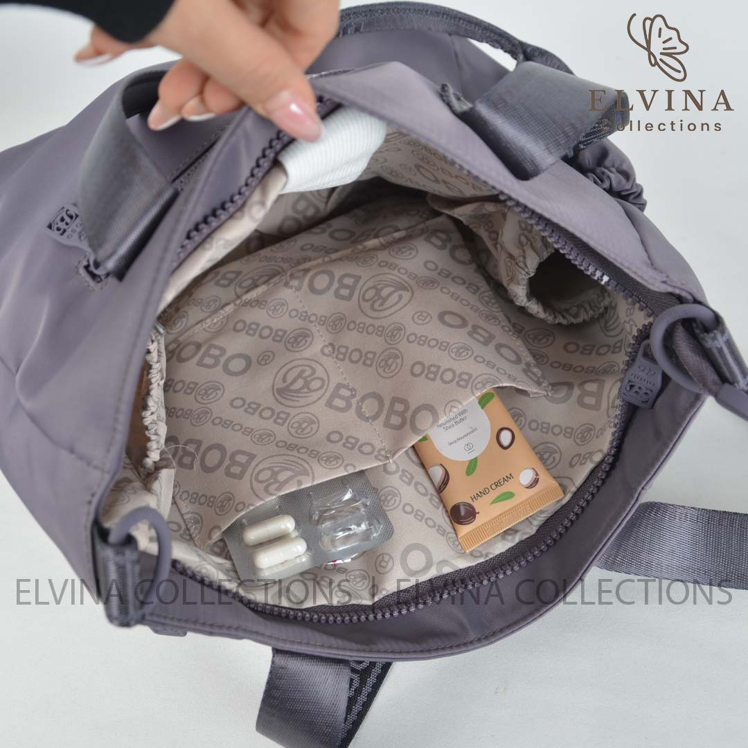 کیف دخترانه بزرگ ملورین برند بوبوBOBO کد 2811 مناسب دانشگاه و روزمره دارای جای تراول ماگ در داخل و تقسیم بندی — تصویر ۵