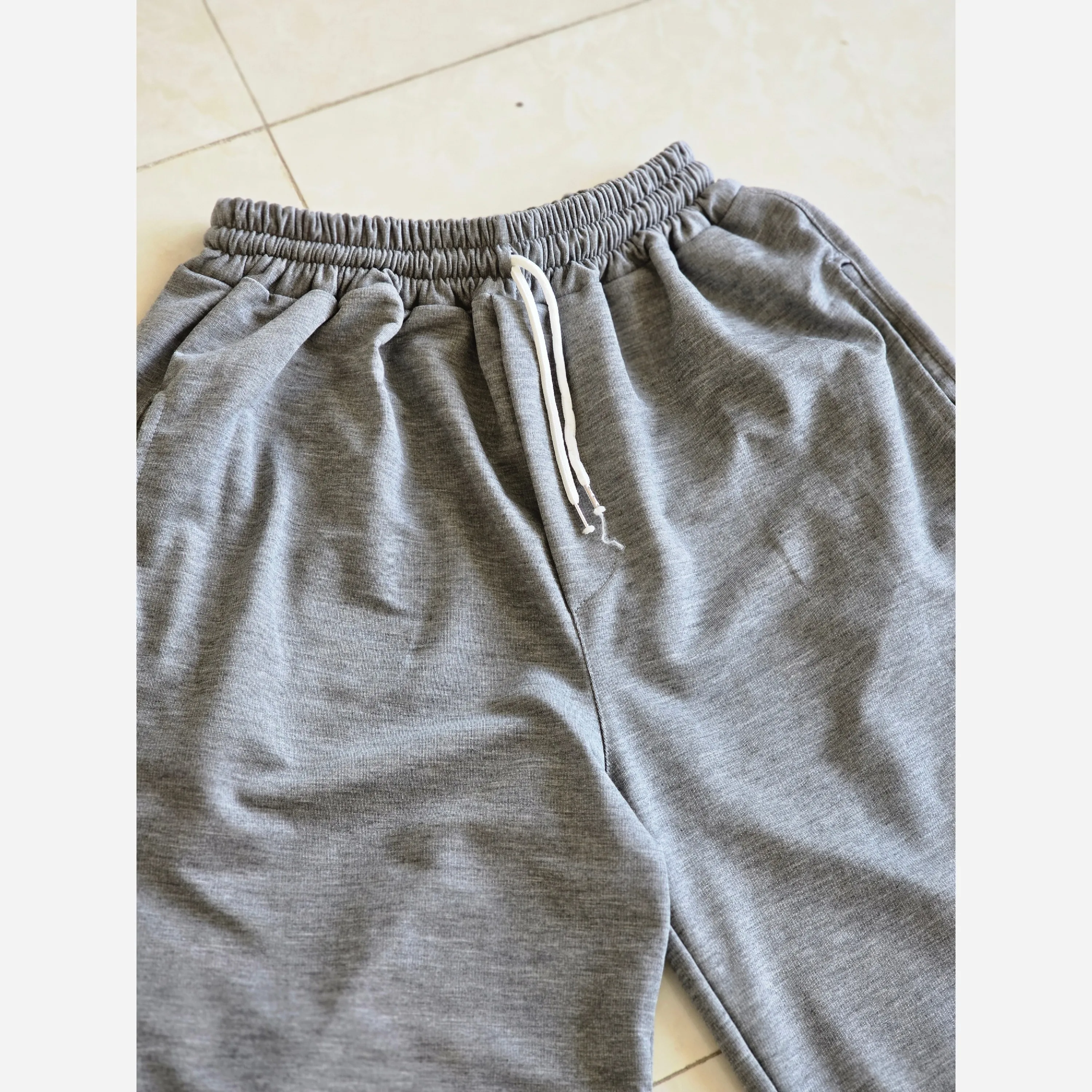 شلوار اسلش فول بگ پارچه ملانژ خنک رنگ طوسی و مشکی سایز بزرگ XXL و XXXL — تصویر ۵