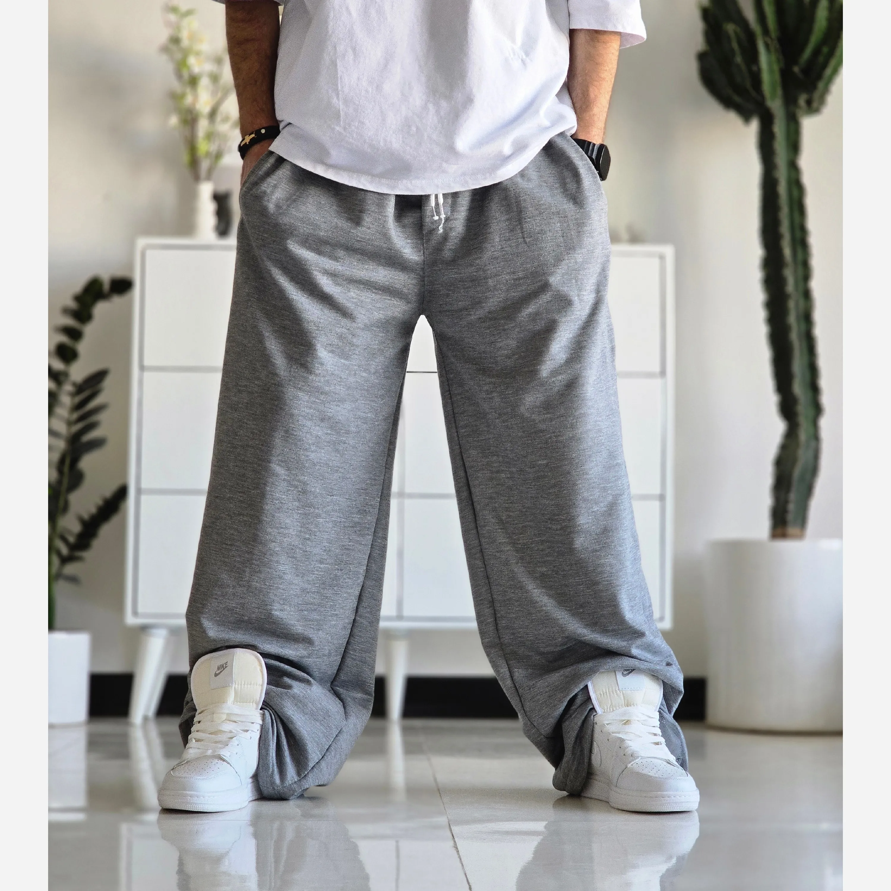 شلوار اسلش فول بگ پارچه ملانژ خنک رنگ طوسی و مشکی سایز بزرگ XXL و XXXL — تصویر ۶