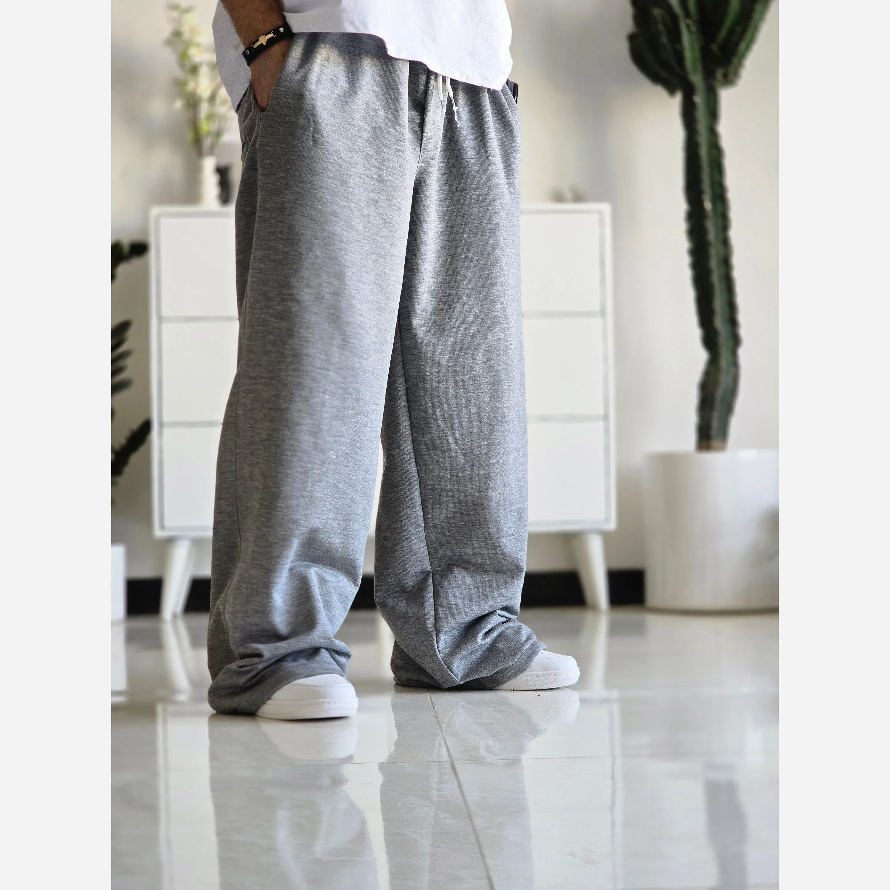 شلوار اسلش فول بگ پارچه ملانژ خنک رنگ طوسی و مشکی سایز بزرگ XXL و XXXL — تصویر ۲