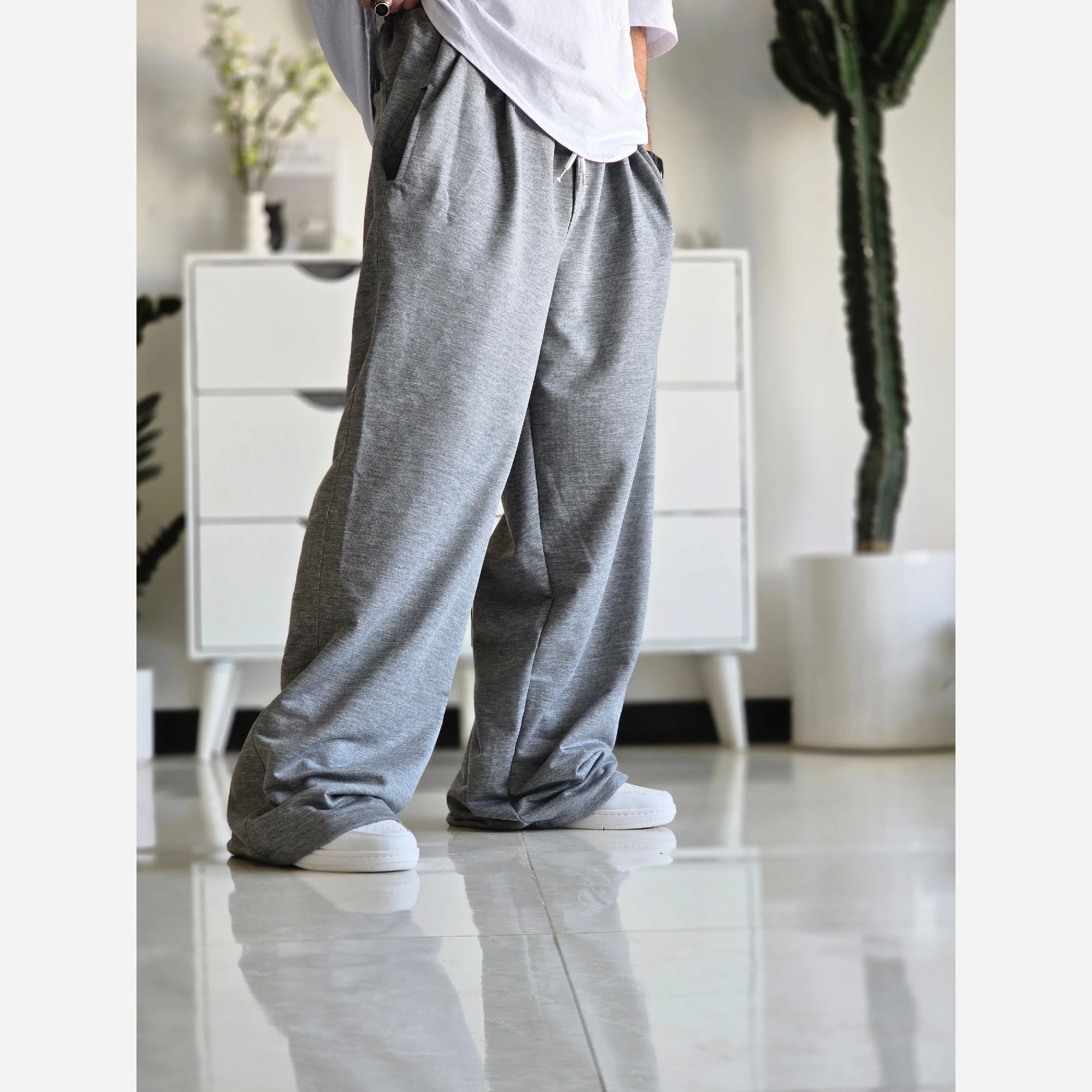 شلوار اسلش فول بگ پارچه ملانژ خنک رنگ طوسی و مشکی سایز بزرگ XXL و XXXL — تصویر ۷