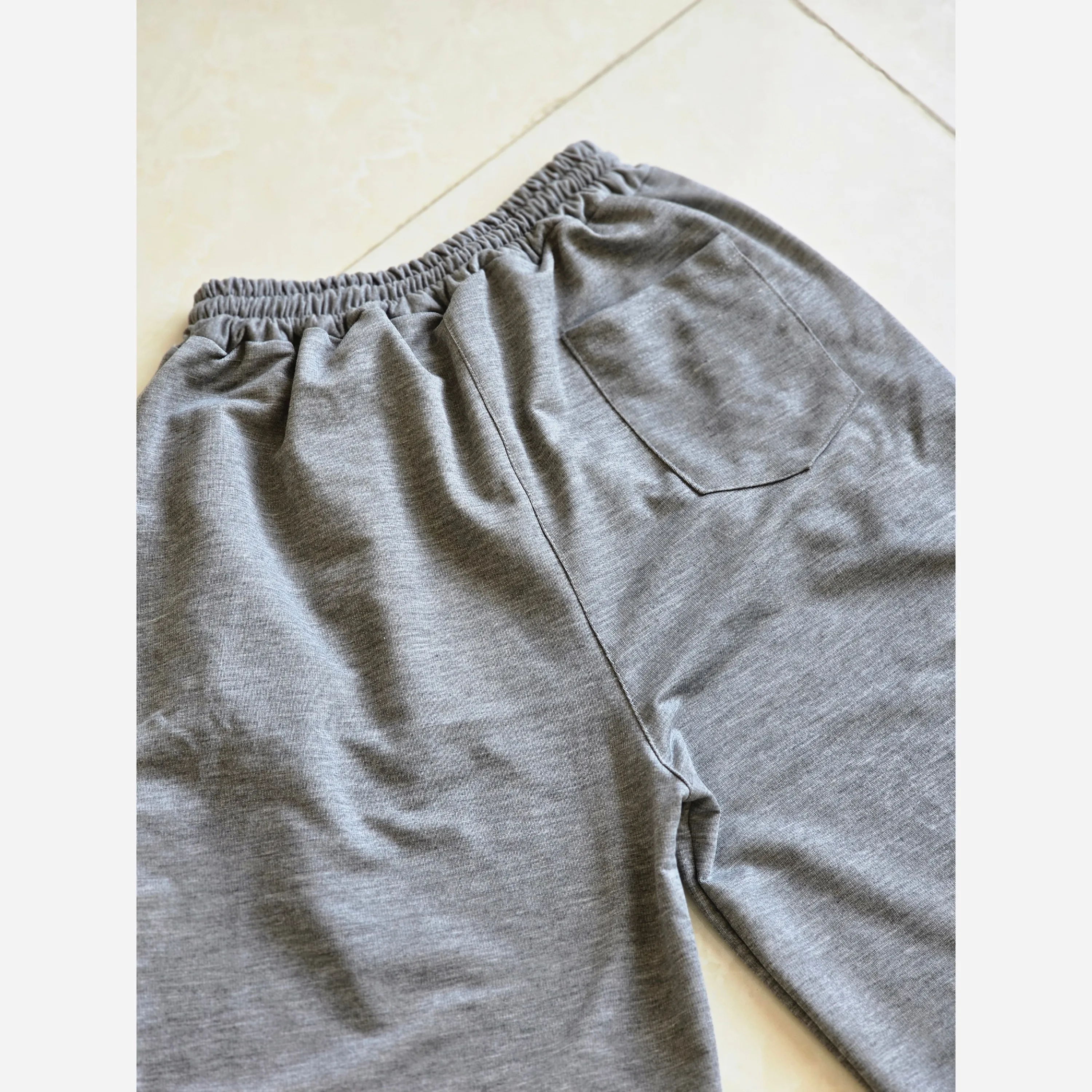شلوار اسلش فول بگ پارچه ملانژ خنک رنگ طوسی و مشکی سایز بزرگ XXL و XXXL — تصویر ۴