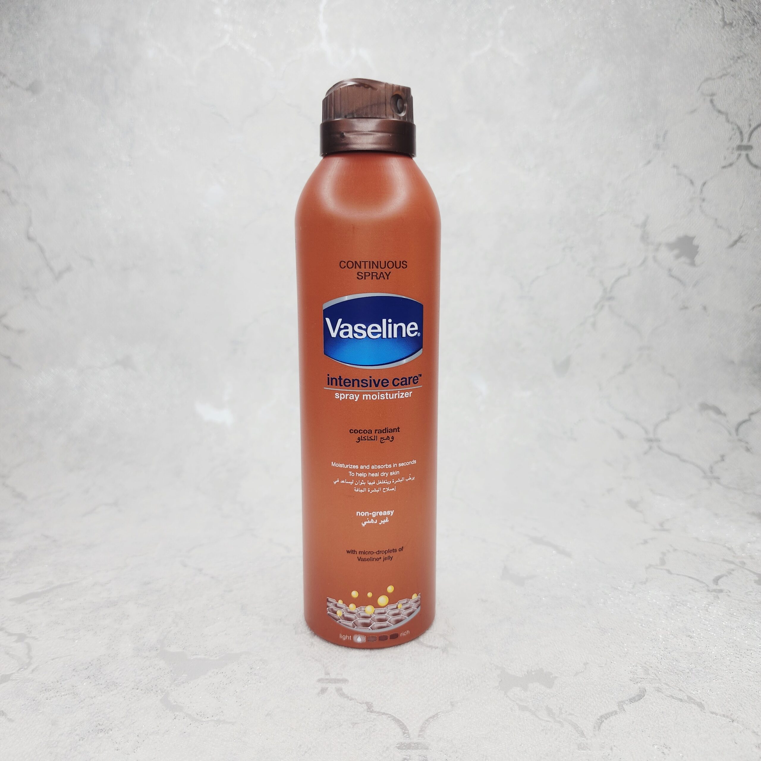 اسپری لوسیون بدن وازلین مدل Cocoa Radiant حجم ۱۹۰میل