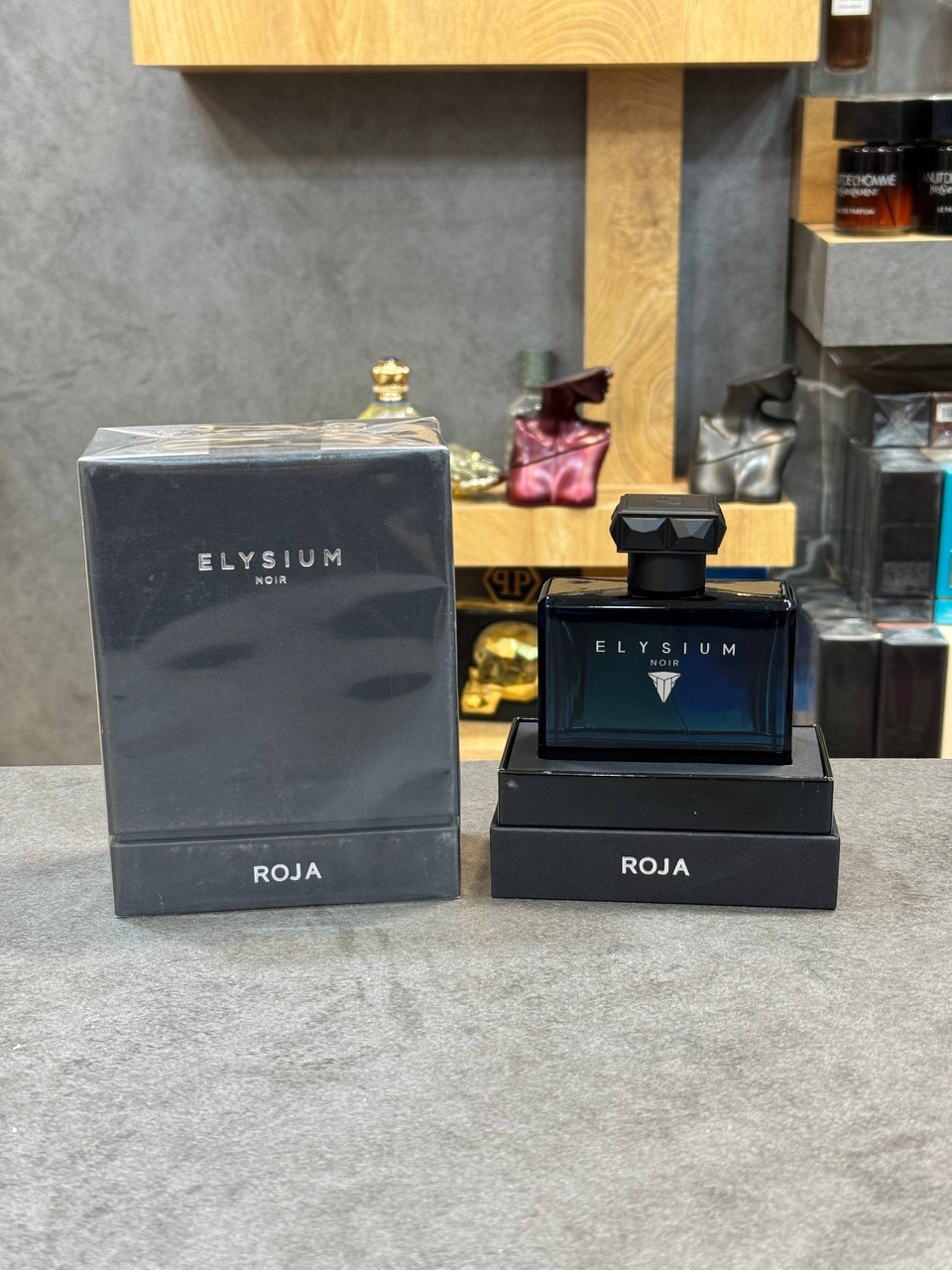 ادکلن روژا الیزیوم نویر مردانه Elysium Noir Roja Dove ١٠٠ میل هاردباکس